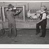 Children looking at poultry on display at 4-H fair. Sublette, Kansas