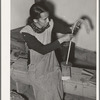 Spanish-American woman spinning woolen thread at WPA (Works Progress Administration/Work Projects Administration) project. Costilla, New Mexico