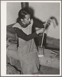 Spanish-American woman spinning woolen thread at WPA (Works Progress Administration/Work Projects Administration) project. Costilla, New Mexico