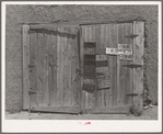 Garage door of Spanish-American farmer near Questa, New Mexico