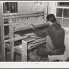 Weaving rag rug at WPA (Works Progress Administrrtion/Work Projects Administration) project. Costilla, New Mexico