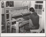 Weaving rag rug at WPA (Works Progress Administrrtion/Work Projects Administration) project. Costilla, New Mexico