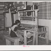 Spanish-American woman weaving rag rug at WPA (Works Progress Administration/Work Projects Administration) project. Costilla, New Mexico