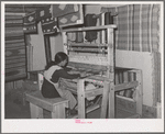 Spanish-American woman weaving rag rug at WPA (Works Progress Administration/Work Projects Administration) project. Costilla, New Mexico