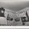 Corner of living room of Spanish-American family near Taos, New Mexico. Notice lace decorations