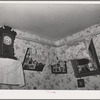 Corner of living room of Spanish-American family near Taos, New Mexico. Notice lace decorations