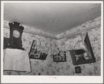 Corner of living room of Spanish-American family near Taos, New Mexico. Notice lace decorations