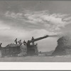Threshing wheat near Questa, New Mexico
