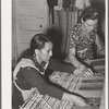 Spanish-American woman weaving rag rug at WPA (Works Progress Administration/Work Projects Administration) project. Costilla, New Mexico