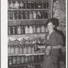 FSA (Farm Security Administration) client with canned goods. Farm, Bradford, Vermont, Orange County