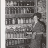 FSA (Farm Security Administration) client with canned goods. Farm, Bradford, Vermont, Orange County