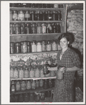FSA (Farm Security Administration) client with canned goods. Farm, Bradford, Vermont, Orange County