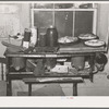 Pies, canned goods and household articles on stove in farm home. Bradford, Vermont, Orange County