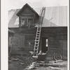 Fall scene on farm. Notice hay in the mow and sleigh before the door. Farm near Bradford, Vermont, Orange County