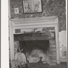 Fireplace in farm home of FSA (Farm Security Administration) client near Bradford, Vermont. Orange County