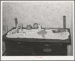 Top of dresser in home of FSA (Farm Security Administration) client. Orange County, near Bradford, Vermont