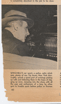 Walter Winchell in his car with police radio