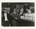 Ada "Bricktop" Smith, owner of the club Bricktop's on Rue Pigalle, Paris, with Fats Waller and others