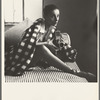 Tanaquil Le Clercq seated with camera