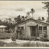 Temporary cabins in which clients live while new houses are being built. Wolf Creek Farms, Georgia