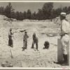 Farmers resettled on Skyline Farms, Alabama, at work in sand quarry under supervision of project manager