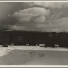 Freightcars in yards of farmers' cooperative. White River Junction, Vermont
