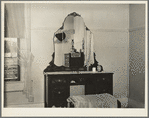 Interior of one of the better houses. Mescalero Reservation, N.M