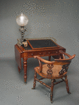 Charles Dickens' desk, writing slope, slope, and chair
