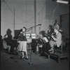 Jazz guitarist Mary Osborne in a recording session for Decca Records, featuring Hy White, guitar; Burt Blake, bass; Cliff Leeman, drums; Jack Pleis, piano