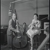 Jazz guitarist Mary Osborne in a recording session for Decca Records, featuring Burt Blake, bass; and Jack Pleis, piano