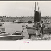 Fishing boats that have helped provide a supplementary income for many of the former sugarcane growers in this section of Louisiana