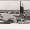 Fishing boats that have helped provide a supplementary income for many of the former sugarcane growers in this section of Louisiana