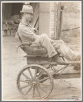 Irwinville Farms, Georgia. Man driving "Hoover cart."