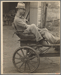 Irwinville Farms, Georgia. Man driving "Hoover cart."