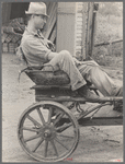 Irwinville Farms, Georgia. Man driving "Hoover cart."