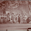 Unidentified cast (chorus, prisoners, Dorothy and the Lion) in the stage production The Wizard of Oz