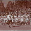 Unidentified ensemble (including the Wizard of Oz and his Emerald Guard) in the stage production The Wizard of Oz