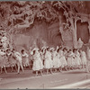 Dance chorus behind Fred Stone (Scarecrow) in the stage production The Wizard of Oz