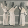 Three men in hats performing Gurdjieff Movements