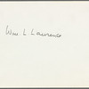 William L. Laurence working at desk
