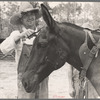 Resettled farmer clipping mule, Grady County, Georgia