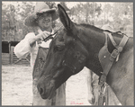 Resettled farmer clipping mule, Grady County, Georgia