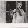 Daughter of sharecropper, Wilmington, North Carolina. Mother and another child in background