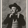Jimmy Durante [with cigar, straightening cravat] in the stage production Jumbo