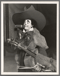 A. Robins [as rodeo clown] with cello in the stage production Jumbo