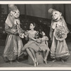 Gloria Grafton, Sybil Elaine flanked by masked figures with bouquets in the stage production Jumbo