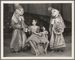 Gloria Grafton, Sybil Elaine flanked by masked figures with bouquets in the stage production Jumbo