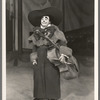 A. Robins [as rodeo clown] with cello in the stage production Jumbo