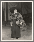 A. Robins [as rodeo clown] with cello in the stage production Jumbo