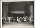 Circus performers lined up on stage under "Considine's Wonder Show" banner in the stage production Jumbo